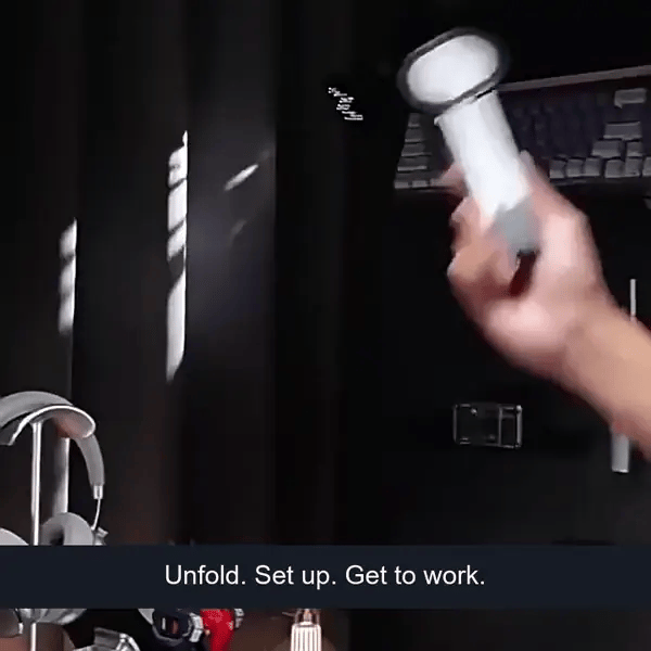 Animated real-product demonstration showing the MagFold stand opening, support setup and laptop placement
